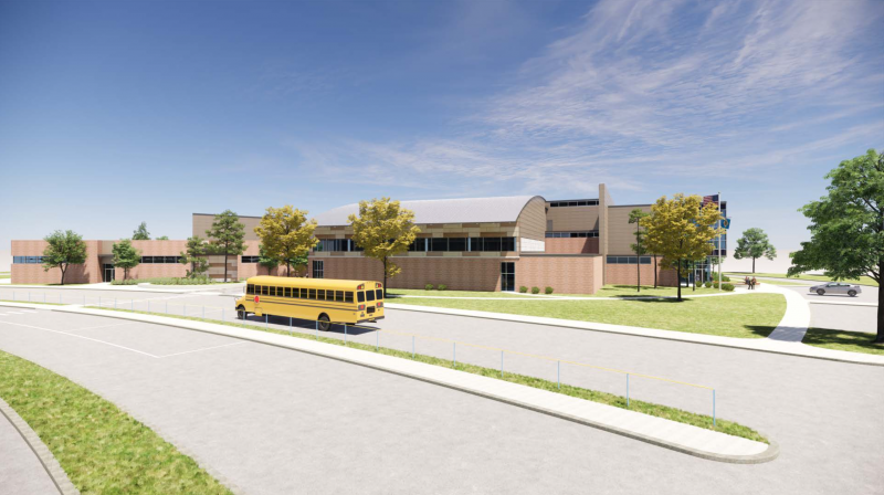 The bus parking lot side of the building.